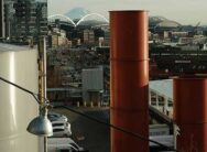 Photo of an industrial smokestack in Seattle's industrial area south of of the stadiums.